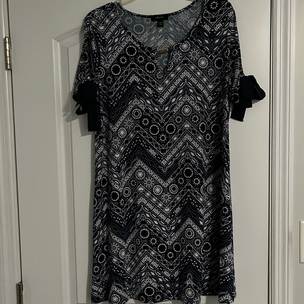 Espresso abstract print dress with tie sleeves.